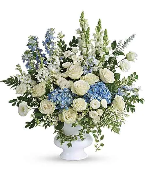 Powder blue and cream white service floor basket in a white pedestal urn
