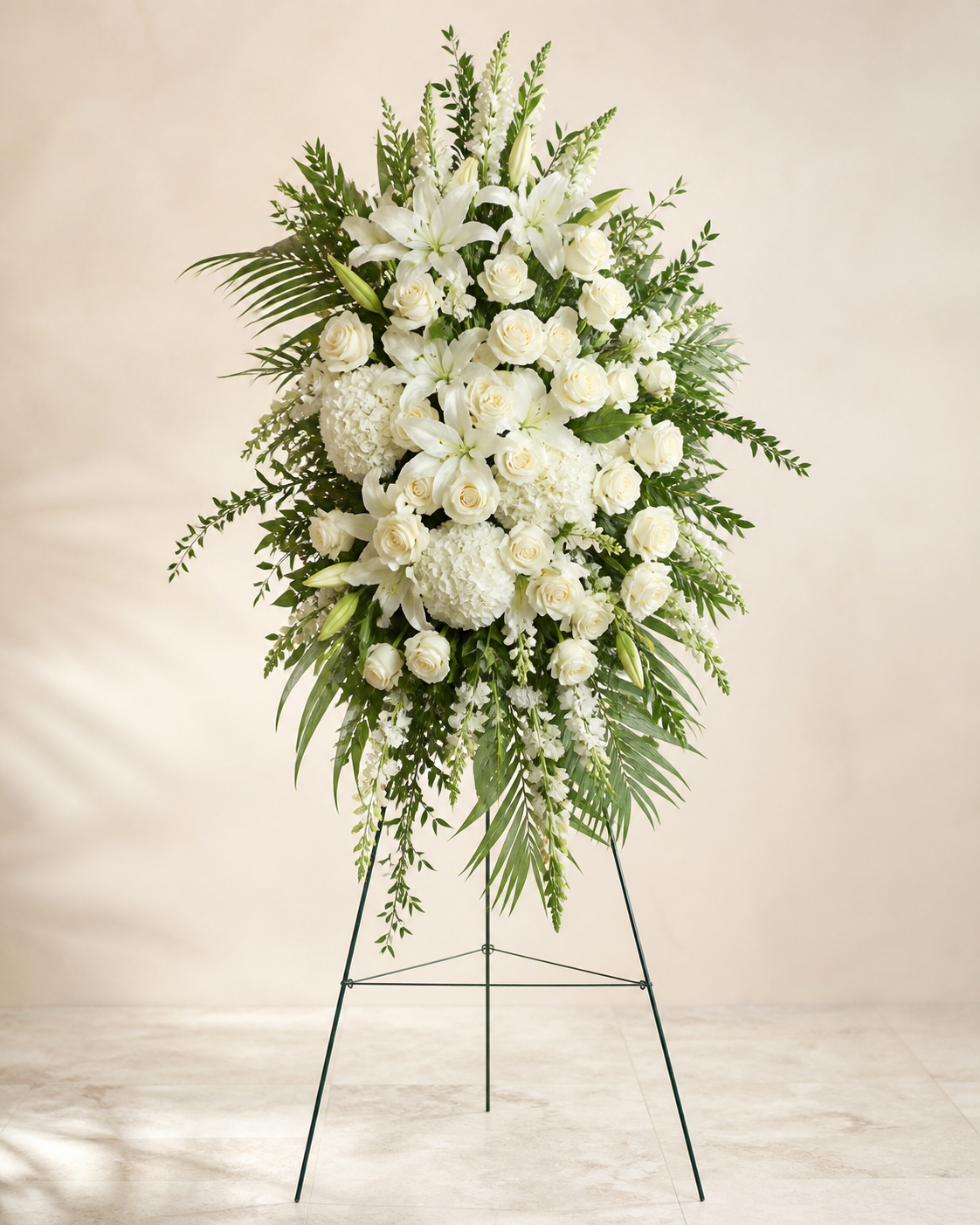 White and green standing spray designed for a funeral service